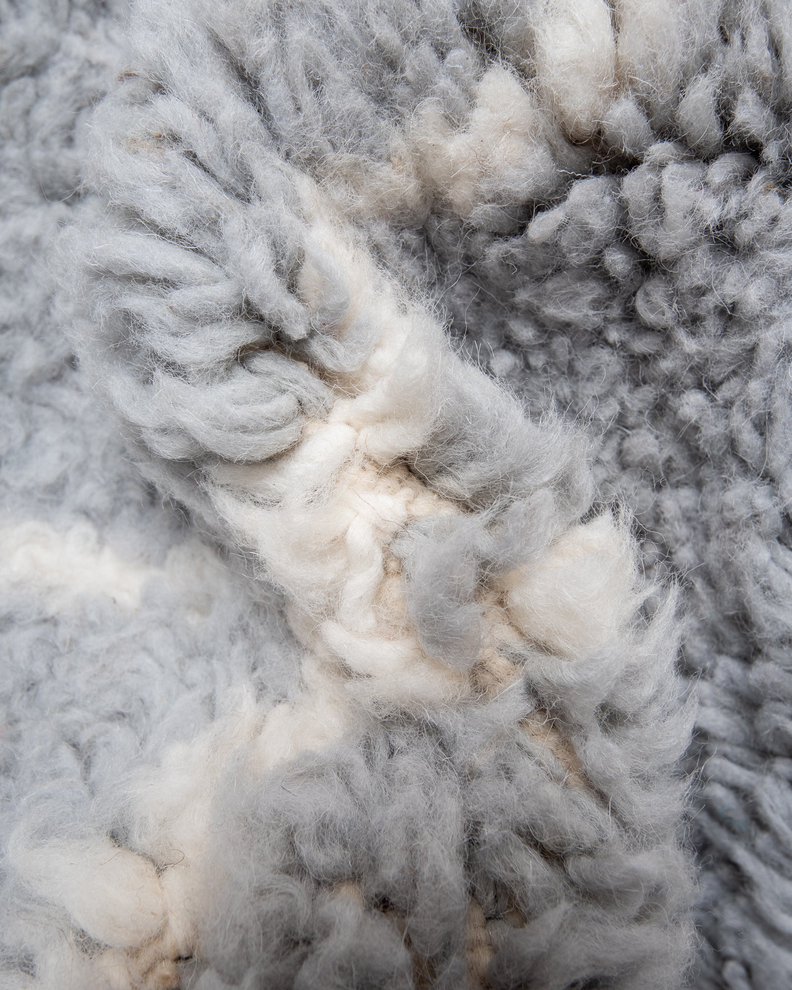 Modern, designer, handcrafted Berber rug from Morocco. Beniourain carpet with beautiful colours and patterns and fluffy wool texture.